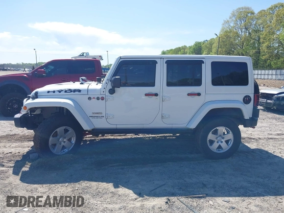 2017 Jeep Wrangler Unlimited Rubicon with VIN 1C4BJWFG9HL695361, listed as a IAAI auction lot 42010655 with 65,536 mi miles and . Bid and sale history available at DreamBid. Image 14.