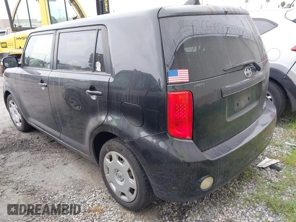 2009 Scion xB with VIN JTLKE50E291093909, listed as a IAAI auction lot 41870259 with 247,549 mi miles. Bid and sale history available at carsss.com. Image 3.