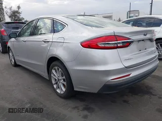 2019 Ford Fusion Hybrid SEL with VIN 3FA6P0MU3KR262056, listed as a IAAI auction lot 41643020 with 1 mi miles. Bid and sale history available at carsss.com. Image 3.