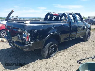 2002 Ford F-150 XL with VIN 2FTRX18LX2CA68793, listed as a IAAI auction lot 42197133 with 143,550 mi miles and . Bid and sale history available at DreamBid. Image 4.