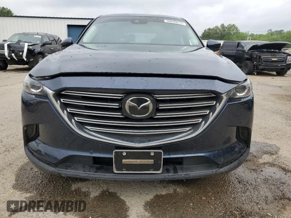 2021 Mazda CX-9 Touring with VIN JM3TCACY2M0512867, listed as a Copart auction lot 56646615 with 92,566 mi miles and Salvage title. Bid and sale history available at DreamBid. Image 5.