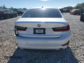 2021 BMW 3 Series 330i with VIN 3MW5R1J01M8B95759, listed as a Copart auction lot 87654485 with 73,864 mi miles and Salvage Title. Bid and sale history available at carsss.com. Image 6.