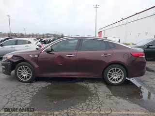 2016 Kia Optima EX with VIN 5XXGU4L31GG004714, listed as a IAAI auction lot 41183230 with 108,084 mi miles. Bid and sale history available at carsss.com. Image 14.