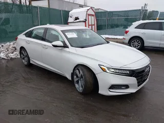 2019 Honda Accord Touring z VIN 1HGCV2F97KA014542, wystawiony jako IAAI lot #41570589 z przebiegiem 82 546 mil mil oraz . Historia ofert i sprzedaży dostępna na DreamBid. Obrazek 1.