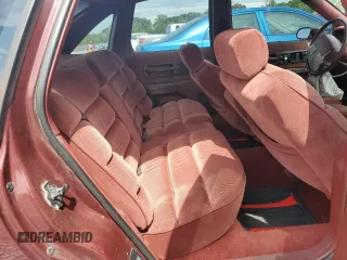 1991 Chevrolet Caprice z VIN 1G1BN53E9MW187619, wystawiony jako Copart lot #55291845 z przebiegiem 1 433 530 mil mil oraz Szkody całkowita. Historia ofert i sprzedaży dostępna na DreamBid. Obrazek 10.