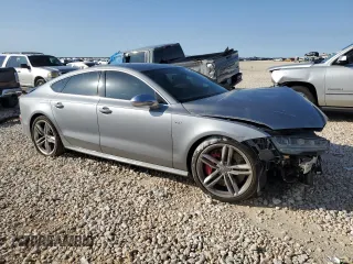 2018 Audi S7 Prestige z VIN WAU2FAFCXJN039744, wystawiony jako Copart lot #81291564 z przebiegiem 73 238 mil mil oraz Szkoda całkowita • Salvage title. Historia ofert i sprzedaży dostępna na DreamBid. Obrazek 4.