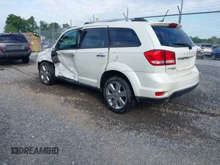 2013 Dodge Journey Crew with VIN 3C4PDDDG9DT685464, listed as a IAAI auction lot 42641982 with 155,901 mi miles and . Bid and sale history available at DreamBid. Image 3.