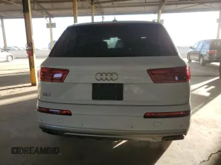 2019 Audi Q7 Premium with VIN WA1AAAF72KD003418, listed as a Copart auction lot 87104674 with 70,863 mi miles and Salvage title. Bid and sale history available at DreamBid. Image 6.