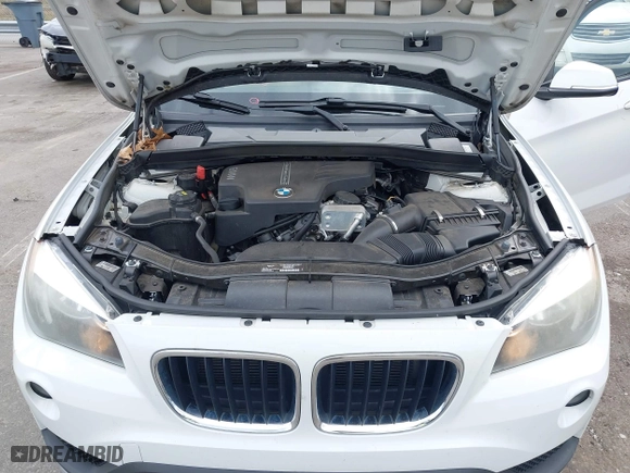 2015 BMW X1 sDrive28i with VIN WBAVM1C50FV314957, listed as a IAAI auction lot 41816402 with 148,410 mi miles. Bid and sale history available at carsss.com. Image 10.