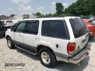 2000 Ford Explorer XLT with VIN 1FMZU83P8YUB63966, listed as a Copart auction lot 59455755 with 136,852 mi miles and Clean title. Bid and sale history available at DreamBid. Image 2.