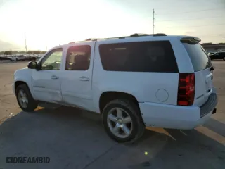 2009 Chevrolet Suburban LT w/2LT with VIN 1GNFC26J09R147755, listed as a Copart auction lot 72418304 with 239,660 mi miles and Salvage Title. Bid and sale history available at carsss.com. Image 2.