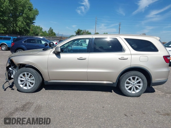 2014 Dodge Durango SXT with VIN 1C4RDJAG0EC455787, listed as a IAAI auction lot 42651627 with 103,218 mi miles and . Bid and sale history available at DreamBid. Image 14.