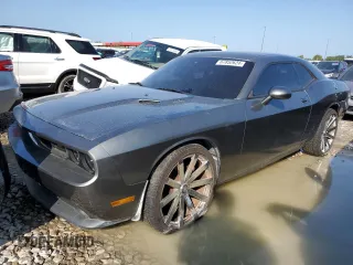 2012 Dodge Challenger R/T z VIN 2C3CDYBT0CH275489, wystawiony jako Copart lot #67852624 z przebiegiem 100 406 mil mil oraz Szkoda całkowita • Salvage title. Historia ofert i sprzedaży dostępna na DreamBid. Obrazek 1.