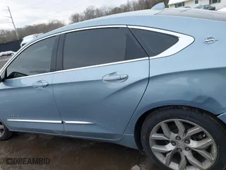 2014 Chevrolet Impala LTZ with VIN 1G1145SL0EU132598, listed as a IAAI auction lot 41264394 with 84,783 mi miles. Bid and sale history available at carsss.com. Image 14.