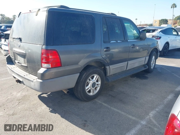 2003 Ford Expedition XLT Value with VIN 1FMPU16W43LA84570, listed as a IAAI auction lot 40937219 with 161,893 mi miles. Bid and sale history available at carsss.com. Image 4.