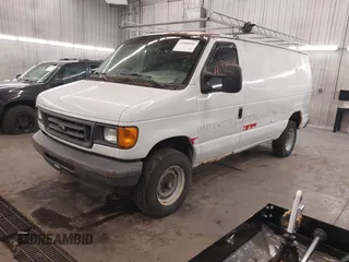 2006 Ford Econoline Cargo with VIN 1FTSE34LX6DA21553, listed as a IAAI auction lot 41980604 with 285,592 mi miles. Bid and sale history available at carsss.com. Image 2.
