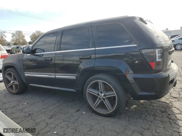 2007 Jeep Grand Cherokee SRT-8 with VIN 1J8HR78357C502665, listed as a Copart auction lot 84772624 with 153,311 mi miles and Clean Title. Bid and sale history available at carsss.com. Image 2.