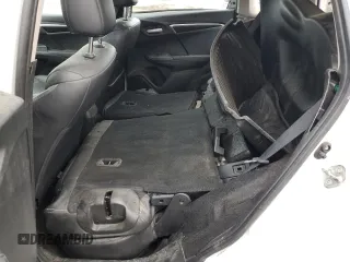 2015 Honda Fit EX-L z VIN 3HGGK5H84FM107978, wystawiony jako Copart lot #54879335 z przebiegiem 193 583 mil mil oraz Nie do naprawy • Non repairable. Historia ofert i sprzedaży dostępna na DreamBid. Obrazek 10.