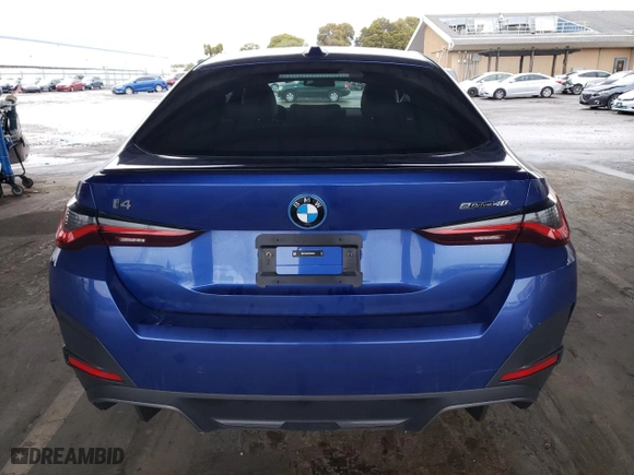 2023 BMW i4 eDrive40 with VIN WBY73AW07PFR45505, listed as a Copart auction lot 49113715 with 12,876 mi miles and Salvage Title. Bid and sale history available at carsss.com. Image 6.