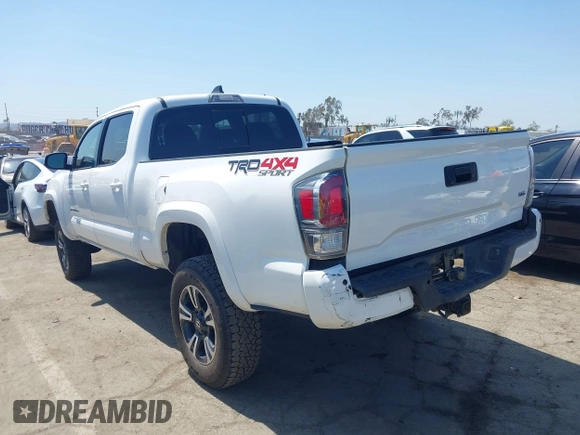 2021 Toyota Tacoma 4WD SR5 with VIN 3TMDZ5BN4MM106693, listed as a IAAI auction lot 41986838 with 52,510 mi miles. Bid and sale history available at carsss.com. Image 3.