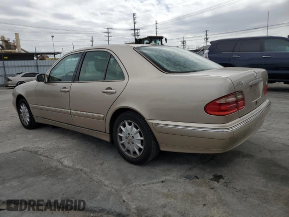 2001 Mercedes-Benz E-Class with VIN WDBJF65J01B251208, listed as a Copart auction lot 47550795 with 228,392 mi miles and Salvage Title. Bid and sale history available at carsss.com. Image 2.