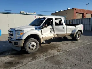 2014 Ford F-450 XL with VIN 1FT8W4DT4EEA08741, listed as a Copart auction lot 77214904 with 168,838 mi miles and Salvage title. Bid and sale history available at DreamBid. Image 1.