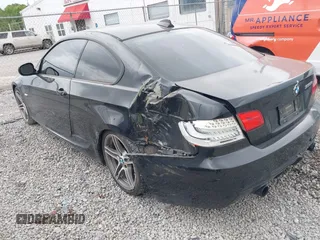 2011 BMW 3 Series 335is with VIN WBAKG1C52BE617565, listed as a IAAI auction lot 42076322 with 136,159 mi miles and . Bid and sale history available at carsss.com. Image 3.