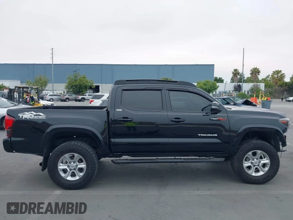 2022 Toyota Tacoma SR5 with VIN 3TMAZ5CN6NM183150, listed as a IAAI auction lot 42563528 with 38,726 mi miles and . Bid and sale history available at DreamBid. Image 14.