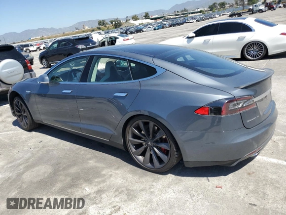 2013 Tesla Model S Performance с VIN 5YJSA1CP1DFP26946, выставлен на аукционе Copart как лот 50133094 с пробегом 80 045 миль миль и Списание • Salvage title. История ставок и продаж доступна на DreamBid. Изображение 2.