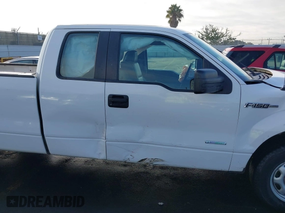 2014 Ford F-150 XL with VIN 1FTFX1CTXEKE24914, listed as a IAAI auction lot 41426666 with 141,451 mi miles. Bid and sale history available at carsss.com. Image 13.