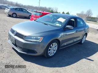 2011 Volkswagen Jetta SE with VIN 3VWBZ7AJ1BM027204, listed as a IAAI auction lot 41816349 with 152,028 mi miles and . Bid and sale history available at DreamBid. Image 2.