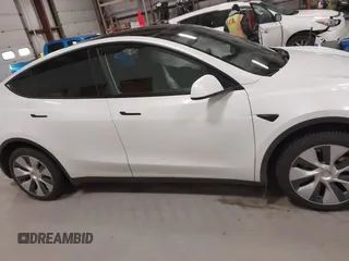 2022 Tesla Model Y Long Range z VIN 7SAYGDEE3NF358487, wystawiony jako IAAI lot #42036969 z przebiegiem 52 723 mil mil oraz . Historia ofert i sprzedaży dostępna na DreamBid. Obrazek 13.