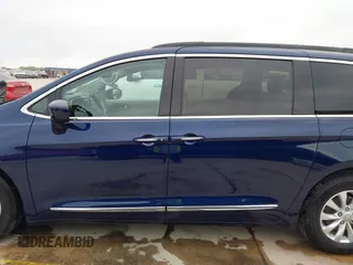 2017 Chrysler Pacifica Touring L with VIN 2C4RC1BG2HR526422, listed as a IAAI auction lot 42032839 with 180,710 mi miles and . Bid and sale history available at DreamBid. Image 14.