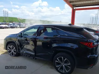 2020 Lexus RX 350 with VIN 2T2HZMAA3LC161293, listed as a IAAI auction lot 42694618 with 43,374 mi miles and . Bid and sale history available at DreamBid. Image 13.