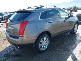 2011 Cadillac SRX Luxury Collection with VIN 3GYFNDEY6BS573962, listed as a IAAI auction lot 41656965 with 155,775 mi miles. Bid and sale history available at carsss.com. Image 4.