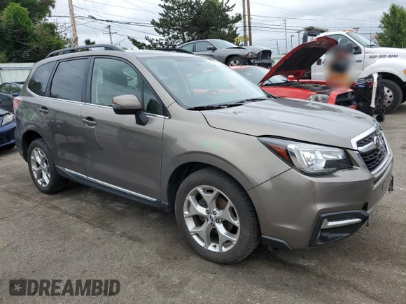 2018 Subaru Forester Touring with VIN JF2SJAWC9JH570189, listed as a Copart auction lot 57940935 with 76,574 mi miles and Salvage title. Bid and sale history available at DreamBid. Image 4.