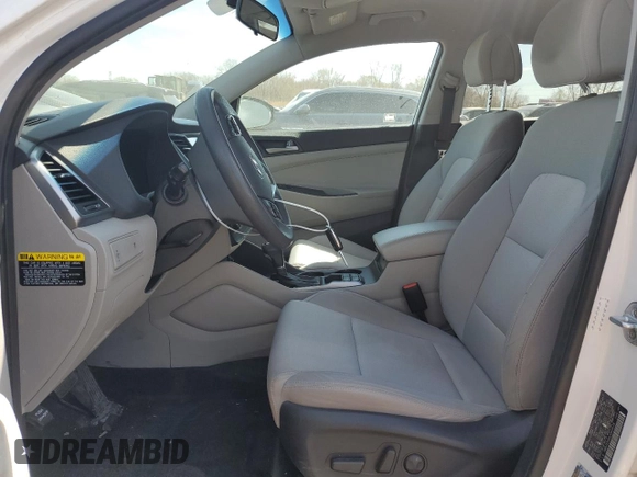 2018 Hyundai Tucson SEL z VIN KM8J33A46JU665618, wystawiony jako Copart lot #53329305 z przebiegiem 146 486 mil mil oraz Szkoda całkowita • Salvage title. Historia ofert i sprzedaży dostępna na DreamBid. Obrazek 7.