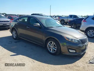 2015 Kia Optima LX with VIN 5XXGM4A79FG353706, listed as a IAAI auction lot 42238995 with 143,389 mi miles and . Bid and sale history available at DreamBid. Image 1.
