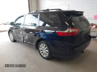2015 Toyota Sienna Limited with VIN 5TDDK3DC9FS104493, listed as a IAAI auction lot 42055937 with 126,728 mi miles and . Bid and sale history available at DreamBid. Image 3.