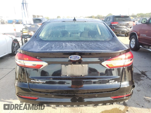 2019 Ford Fusion Hybrid SE with VIN 3FA6P0LU4KR141294, listed as a Copart auction lot 65058972 with 96,211 mi miles. Bid and sale history available at carsss.com. Image 6.