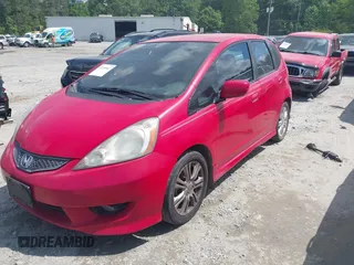 2011 Honda Fit Sport with VIN JHMGE8H50BC003110, listed as a IAAI auction lot 42210062 with 185,571 mi miles and . Bid and sale history available at DreamBid. Image 2.