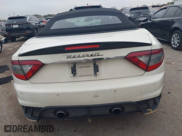 2013 Maserati GranTurismo Convertible Sport with VIN ZAM45VMA9D0070293, listed as a IAAI auction lot 41241020 with 69,156 mi miles. Bid and sale history available at carsss.com. Image 16.