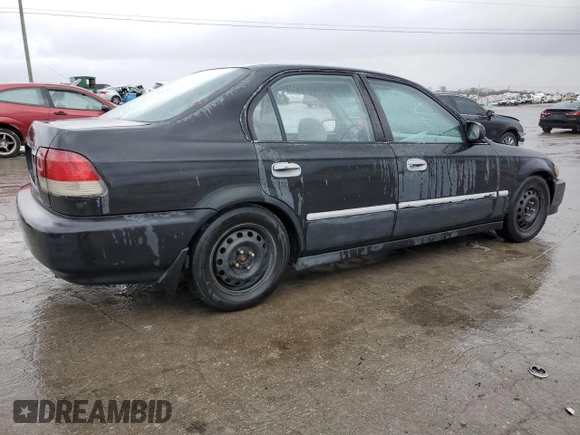 1998 Honda Civic LX with VIN 1HGEJ6579WL053784, listed as a Copart auction lot 47759575 with 298,142 mi miles and Salvage Title. Bid and sale history available at DreamBid. Image 3.