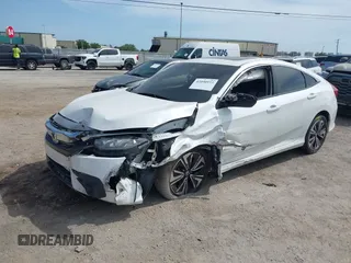 2018 Honda Civic EX-T z VIN 19XFC1F3XJE004123, wystawiony jako IAAI lot #42090933 z przebiegiem 81 228 mil mil oraz . Historia ofert i sprzedaży dostępna na DreamBid. Obrazek 17.