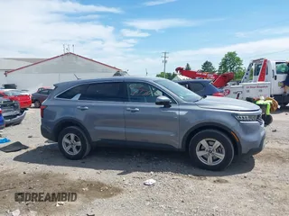 2023 Kia Sorento LX with VIN 5XYRGDLC9PG240958, listed as a IAAI auction lot 42297720 with 27,485 mi miles and . Bid and sale history available at DreamBid. Image 13.