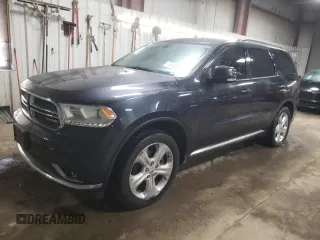 2014 Dodge Durango Limited with VIN 1C4SDJDTXEC332900, listed as a Copart auction lot 75940244 with 221,196 mi miles and Salvage title. Bid and sale history available at DreamBid. Image 1.
