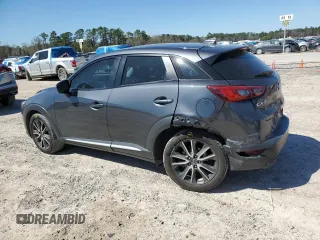 2016 Mazda CX-3 Grand Touring with VIN JM1DKBD7XG0109347, listed as a Copart auction lot 48655745 with 103,674 mi miles and Salvage Title. Bid and sale history available at carsss.com. Image 2.