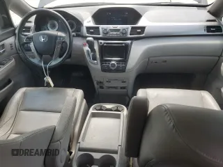 2016 Honda Odyssey Touring Elite with VIN 5FNRL5H97GB038917, listed as a Copart auction lot 54479375 with 165,432 mi miles and Salvage Title. Bid and sale history available at DreamBid. Image 8.
