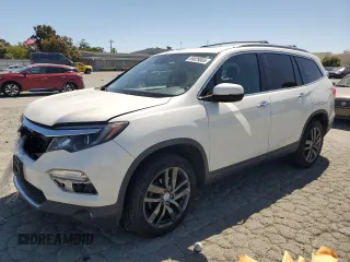 2017 Honda Pilot Touring z VIN 5FNYF6H94HB054342, wystawiony jako Copart lot #59029005 z przebiegiem 135 373 mil mil oraz Szkoda całkowita • Salvage title. Historia ofert i sprzedaży dostępna na DreamBid. Obrazek 1.