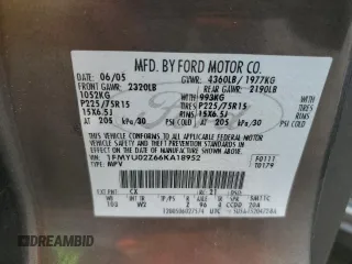2006 Ford Escape XLS with VIN 1FMYU02Z66KA18952, listed as a Copart auction lot 60472305 with 221,258 mi miles and Salvage title. Bid and sale history available at DreamBid. Image 13.